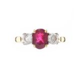 18CT GOLD RUBY AND DIAMOND THREE STONE RING