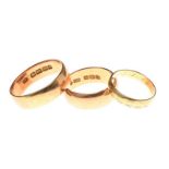 THREE 18CT GOLD RINGS