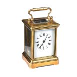 MINIATURE BRASS CARRIAGE CLOCK