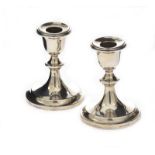 PAIR OF SILVER DWARF CANDLESTICKS