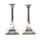 PAIR OF SILVER CANDLESTICKS COMPLETE WITH DIP TRAYS AND LOADED BASES
