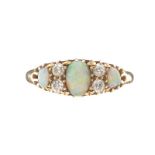 18CT GOLD OPAL AND DIAMOND RING