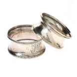 TWO SILVER NAPKIN RINGS