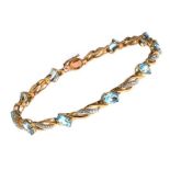 9CT GOLD BLUE TOPAZ AND DIAMOND BRACELET