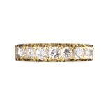 18CT GOLD SEVEN STONE DIAMOND RING