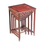 ANTIQUE CHINESE CHERRYWOOD NEST OF FOUR TABLES