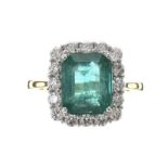 18CT GOLD EMERALD AND DIAMOND RING