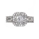 18CT WHITE GOLD THREE STONE DIAMOND HALO RING