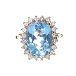 18CT GOLD BLUE TOPAZ AND DIAMOND RING