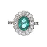 PLATINUM EMERALD AND DIAMOND CLUSTER RING