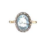 18CT GOLD AQUAMARINE AND DIAMOND RING