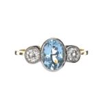 18CT GOLD AND PLATINUM AQUAMARINE AND DIAMOND RING