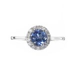 18CT WHITE GOLD TANZANITE AND DIAMOND HALO CLUSTER RING