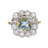 18CT GOLD AQUAMARINE AND DIAMOND RING