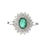 18CT WHITE GOLD EMERALD AND DIAMOND RING