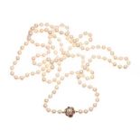 STRAND OF CULTURED PEARLS WITH 14CT GOLD GARNET AND PEARL SET CLASP