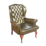 VINTAGE GREEN LEATHER ARMCHAIR