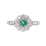 18CT WHITE GOLD EMERALD AND DIAMOND RING