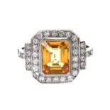 PLATINUM YELLOW SAPPHIRE AND DIAMOND RING