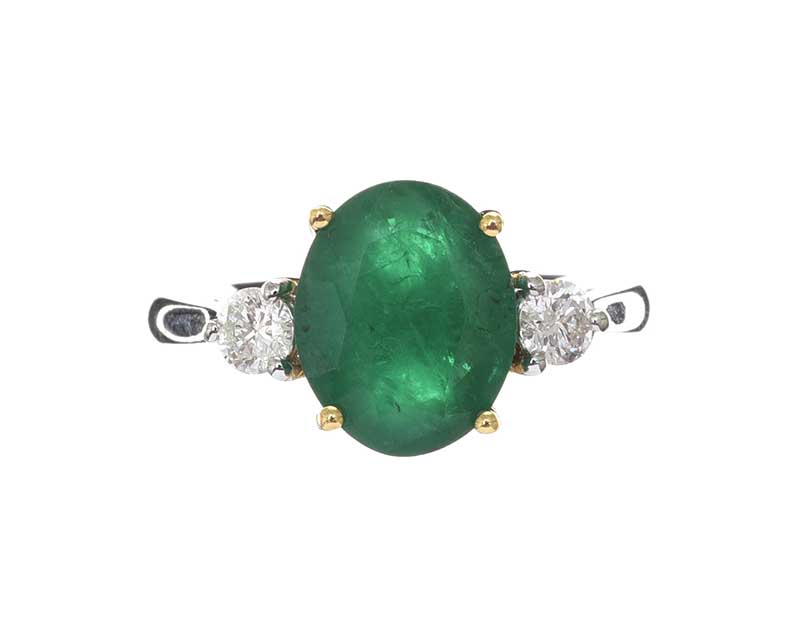 18CT GOLD EMERALD AND DIAMOND RING