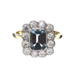 PLATINUM AND 18CT GOLD AQUAMARINE AND DIAMOND CLUSTER RING