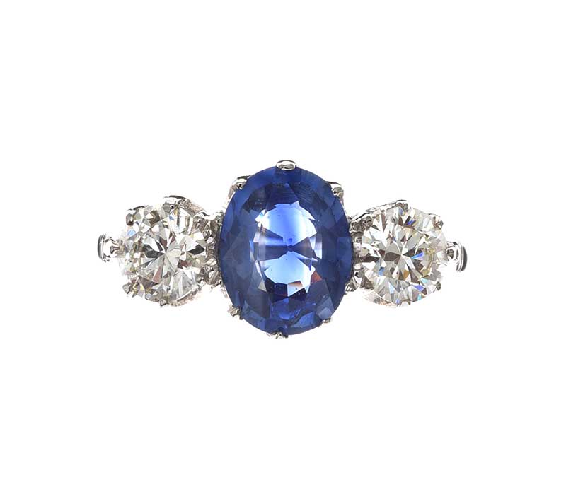 18CT WHITE GOLD SAPPHIRE AND DIAMOND THREE STONE RING