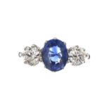 18CT WHITE GOLD SAPPHIRE AND DIAMOND THREE STONE RING