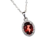 18CT WHITE GOLD GARNET AND DIAMOND NECKLACE