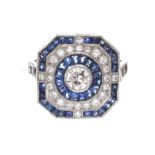 PLATINUM SAPPHIRE AND DIAMOND CALIBRE RING