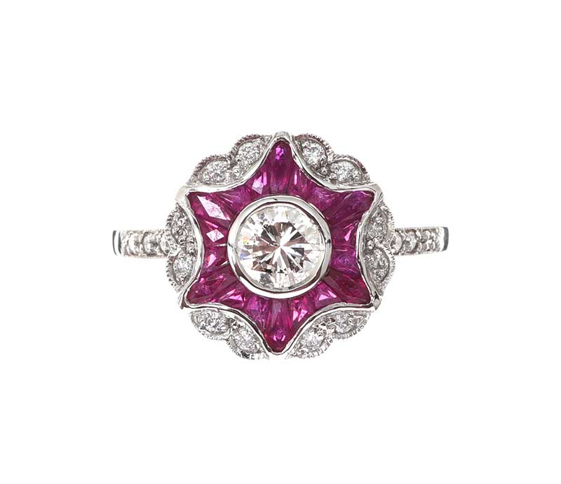 PLATINUM RUBY AND DIAMOND CALIBRE RING