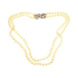 CINER DOUBLE STRAND OF COSTUME PEARLS