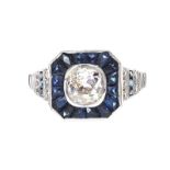 18CT WHITE GOLD SAPPHIRE AND DIAMOND CALIBRE RING