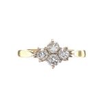 18CT GOLD FOUR STONE DIAMOND RING