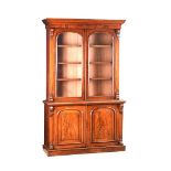 VICTORIAN MAHOGANY TWO DOOR BOOKCASE