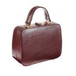 1970'S BURGANDY LEATHER MAKE-UP CASE