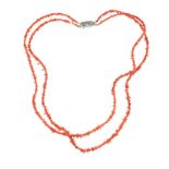 DOUBLE STRAND OF CORAL BEADS WITH SILVER CLASP