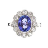 18CT WHITE GOLD TANZANITE AND DIAMOND CLUSTER RING