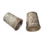 A PAIR OF STERLING SILVER THIMBLES