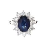 PLATINUM SAPPHIRE AND DIAMOND CLUSTER RING