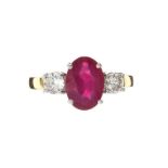 18CT GOLD RUBY AND DIAMOND THREE STONE RING