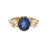 18CT GOLD SAPPHIRE AND DIAMOND THREE STONE RING