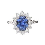 PLATINUM SAPPHIRE AND DIAMOND CLUSTER RING