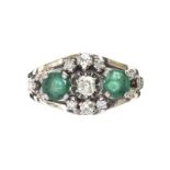 18CT WHITE GOLD EMERALD AND DIAMOND CLUSTER RING