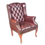 LEATHER WINGED BACK ARMCHAIR
