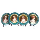 SET OF FOUR PORCELAIN PLATES