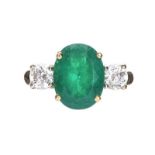 18CT GOLD EMERALD AND DIAMOND THREE STONE RING