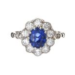 PLATINUM SAPPHIRE AND DIAMOND CLUSTER RING