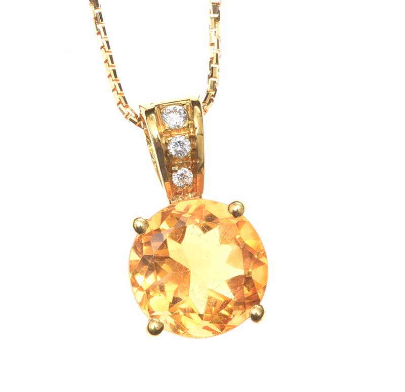 18CT GOLD CITRINE AND DIAMOND PENDANT AND CHAIN