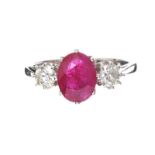 18CT WHITE GOLD RUBY AND DIAMOND THREE STONE RING