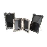 THREE VINTAGE SILVER-TONE PHOTO FRAMES